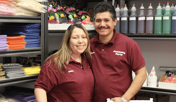 Feliciano and Ines in their store, Peninsula Party Rentals
