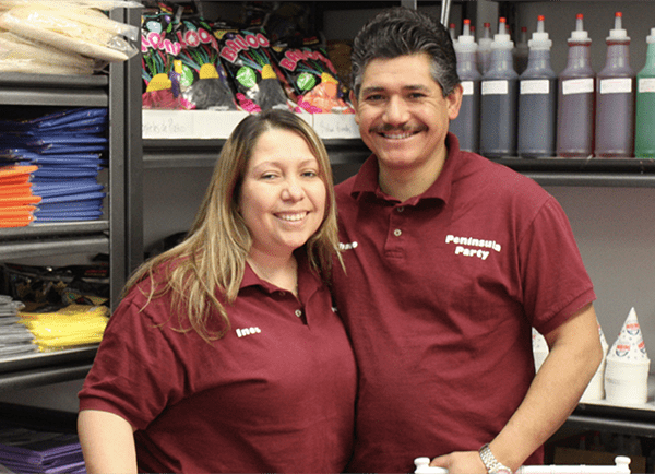 Feliciano and Ines in their store, Peninsula Party Rentals