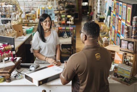 UPS employee helping a customer