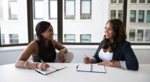 Two women in an office working