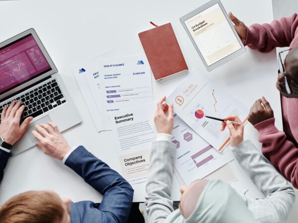 Business owners working together to build their business plan blueprint