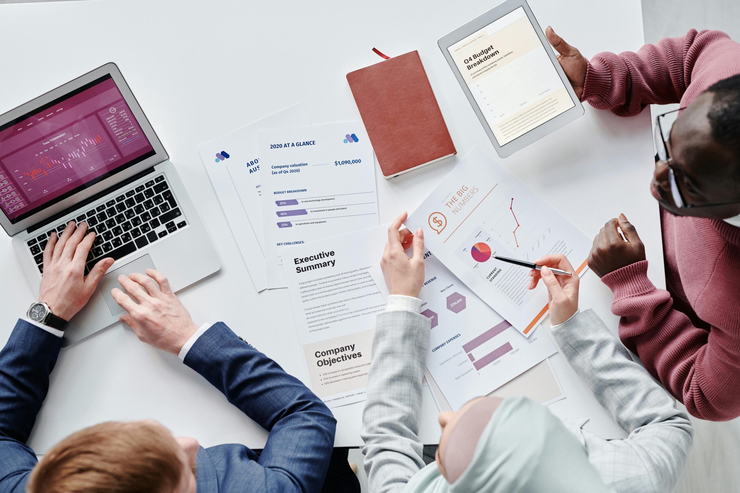 Business owners working together to build their business plan blueprint