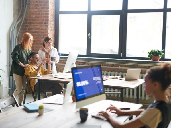 Business owners building customer trust through small business cybersecurity