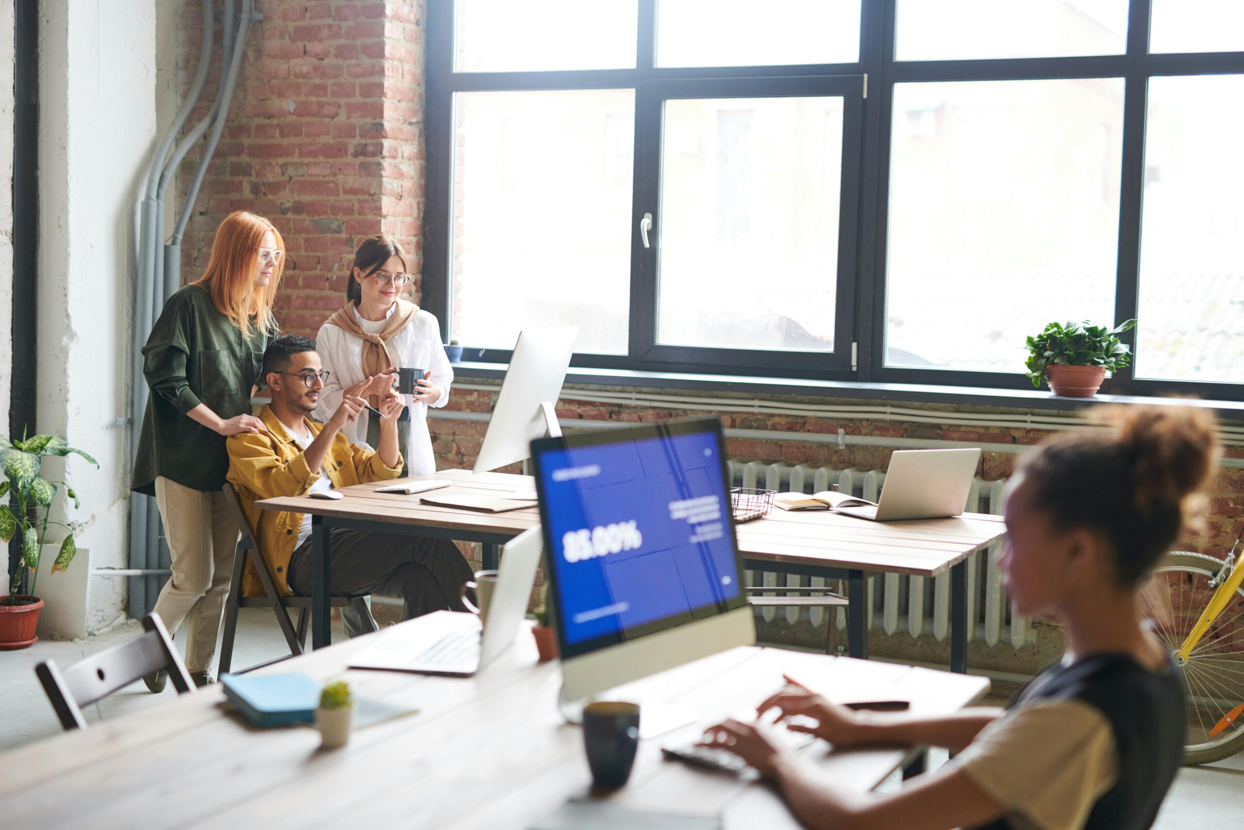 Business owners building customer trust through small business cybersecurity