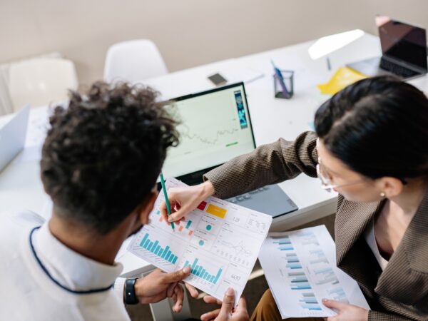 Business owners discussing marketing investment for their small business