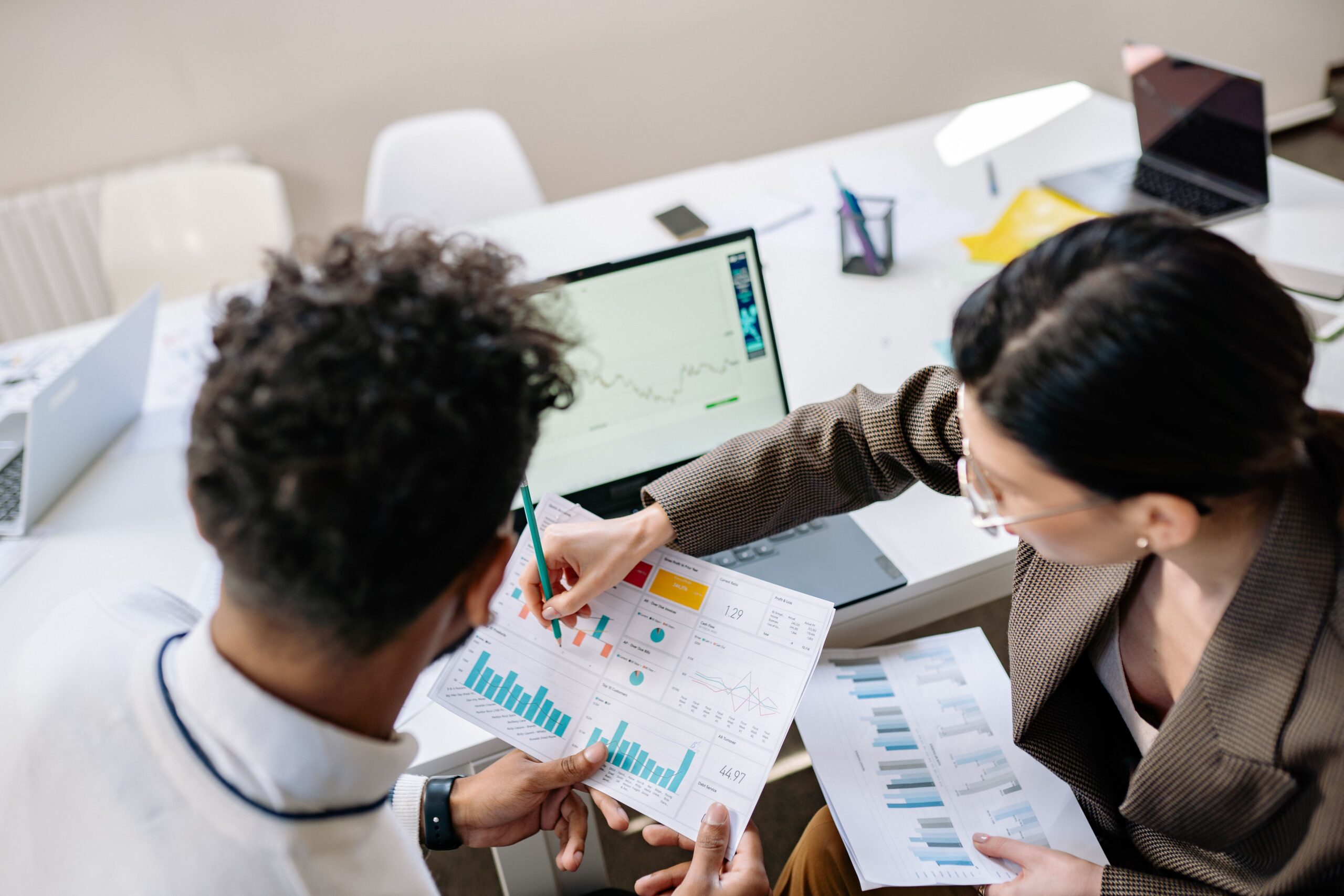 Business owners discussing marketing investment for their small business